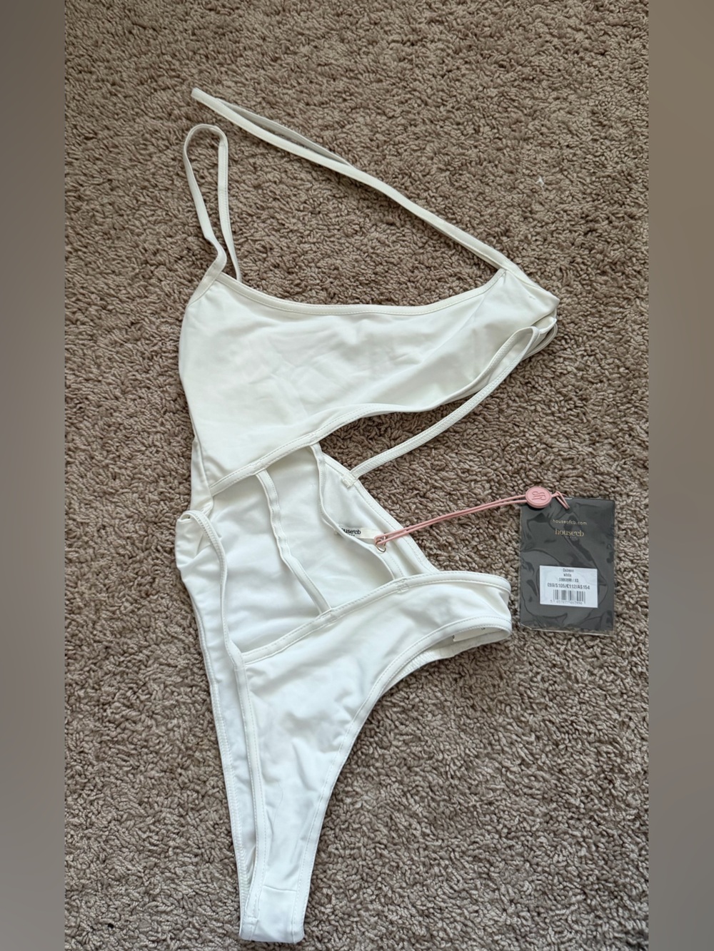 House of CB white asymmetrical strappy one-piece NWT